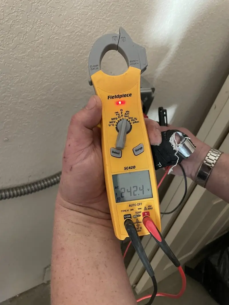 Voltage testing with clamp meter during Ceiling Fan Installation in Granite City